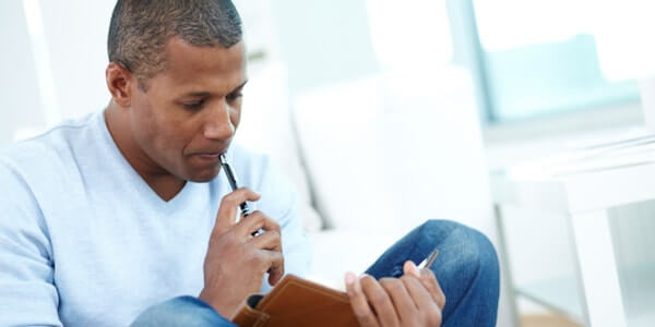 man writing - what is writing therapy journal therapy 